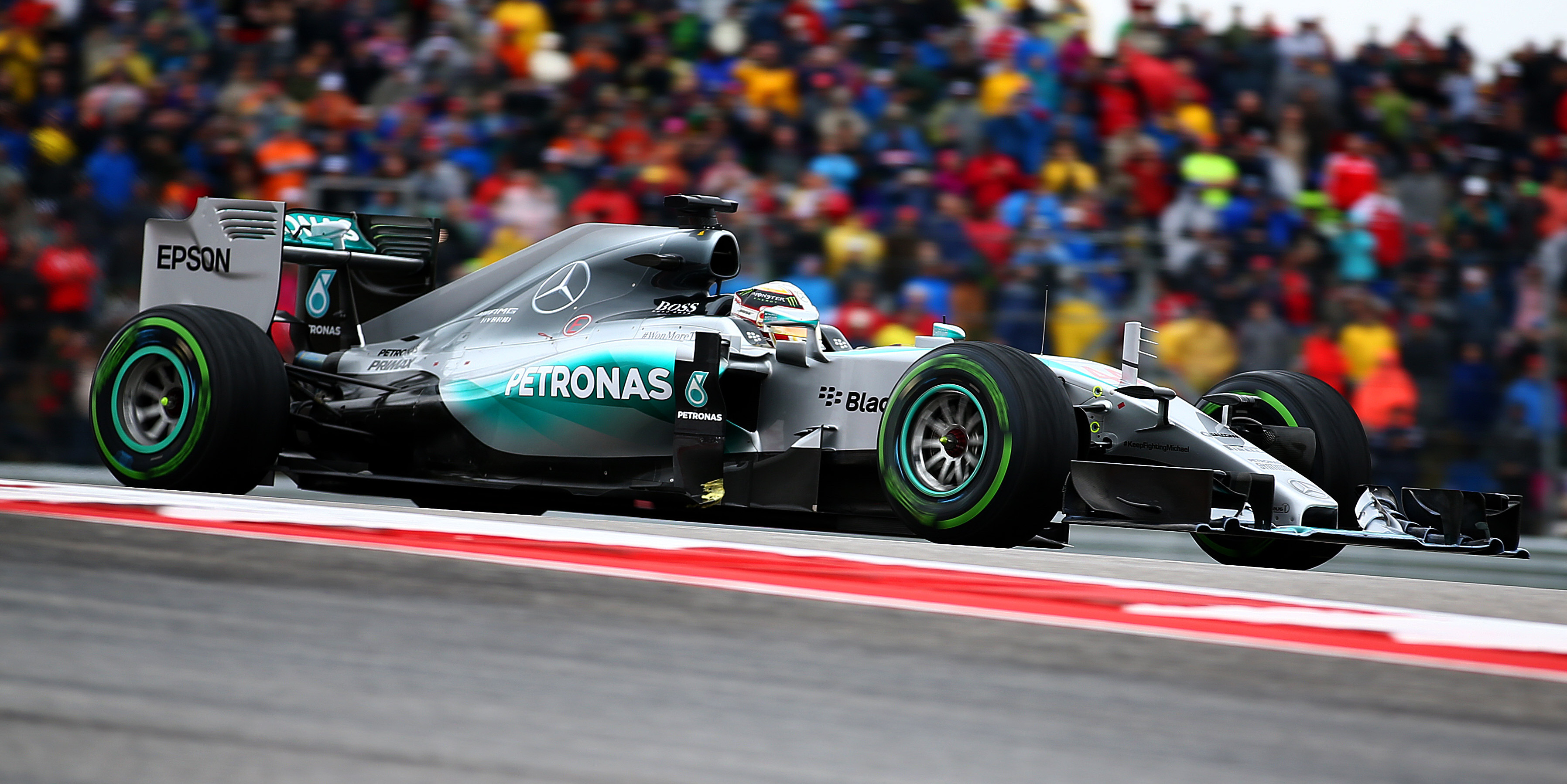 Hamilton wins chaotic US GP to secure third title
