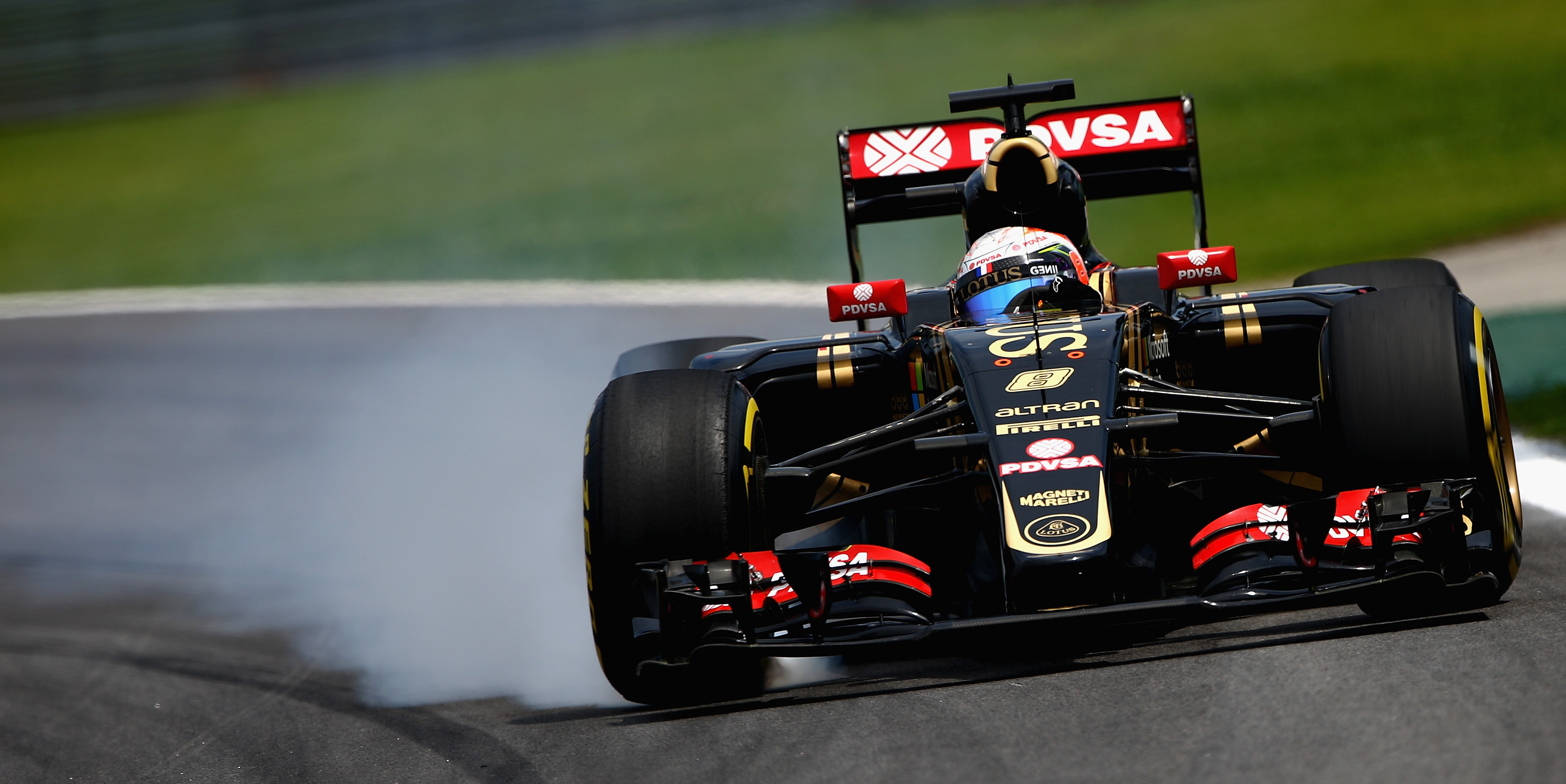 Grosjean Scores Points In Emotional Weekend