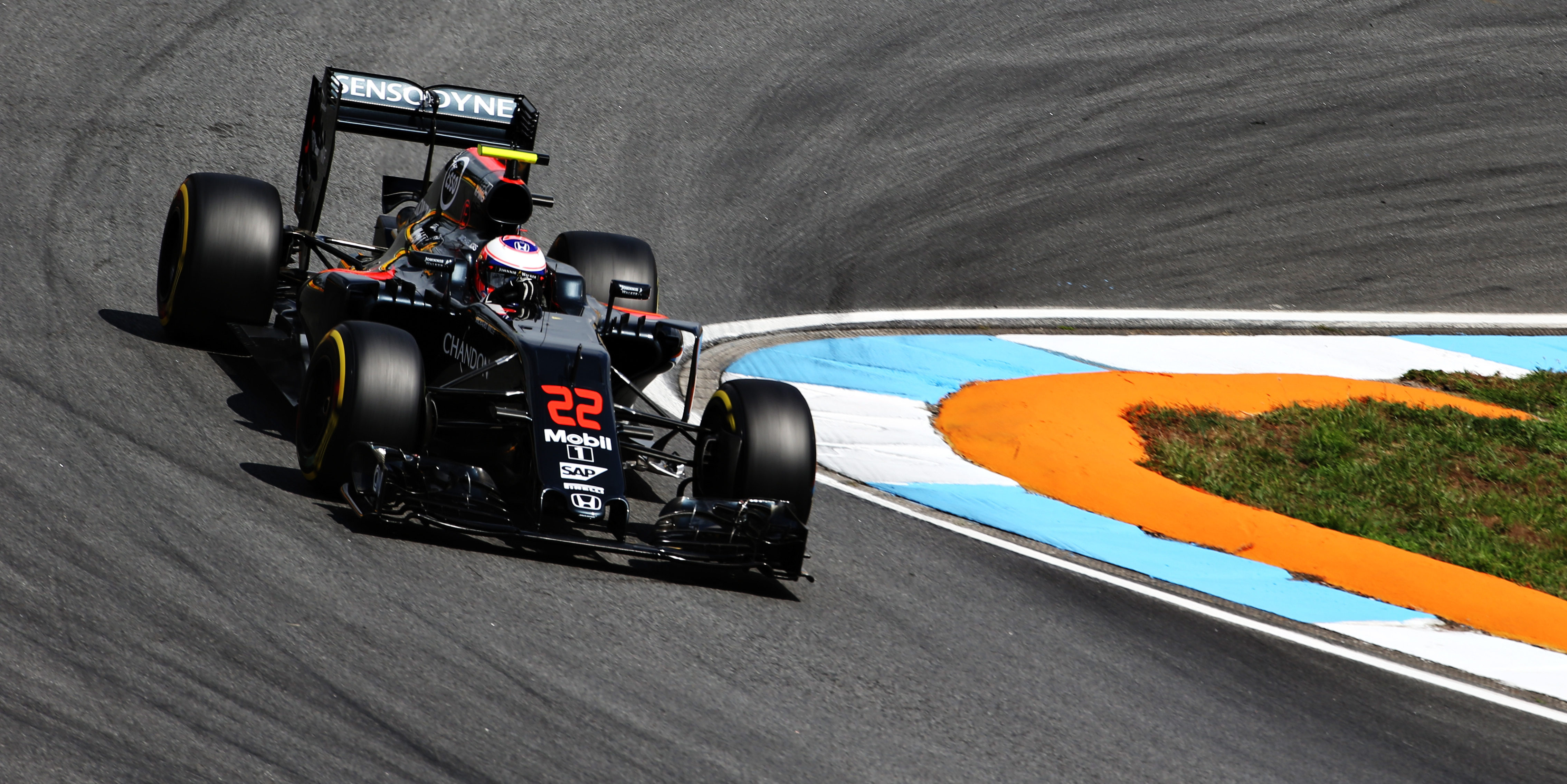 Button cleared to race after hospital visit