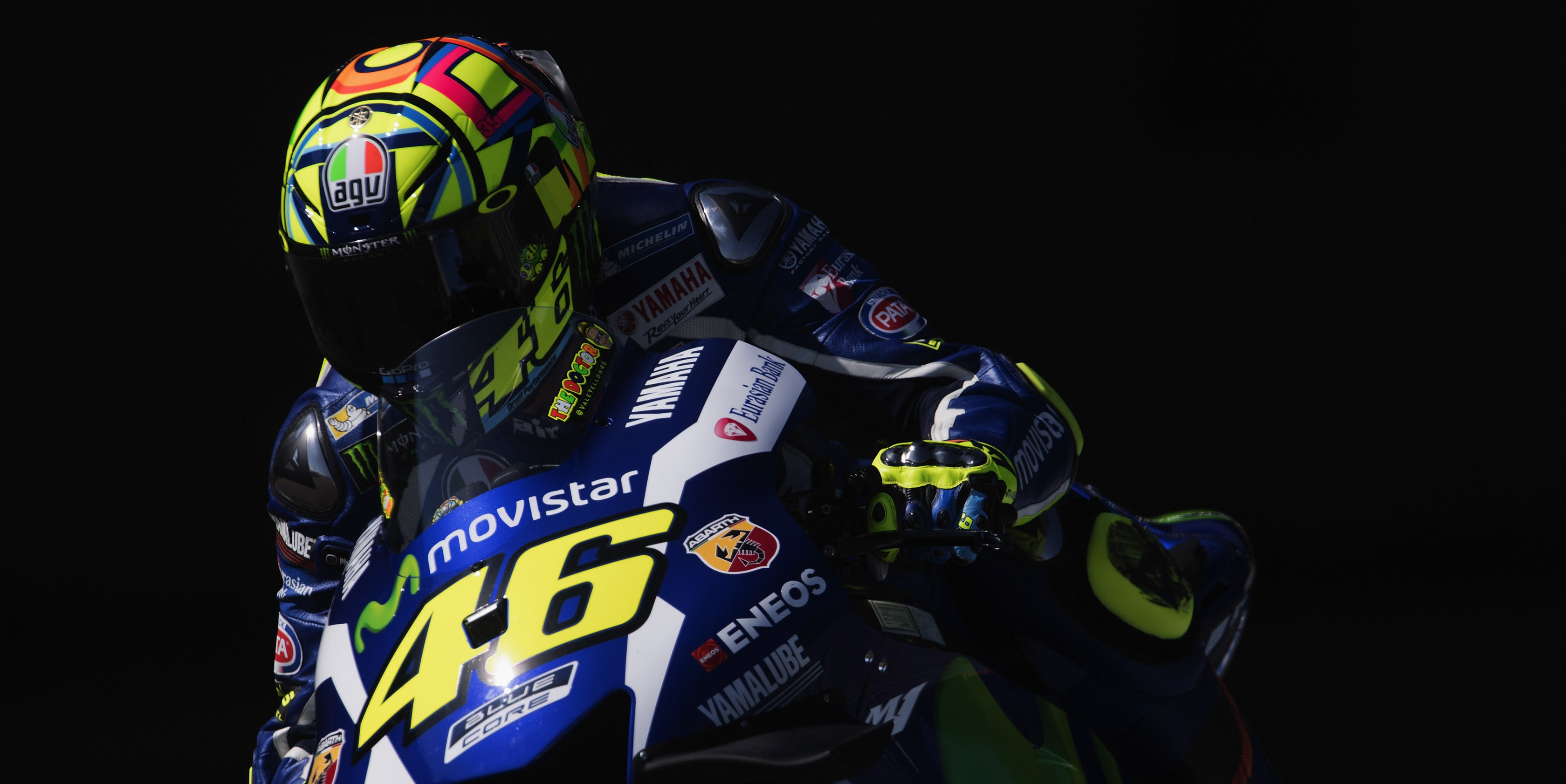 Rossi takes pole despite physical woes