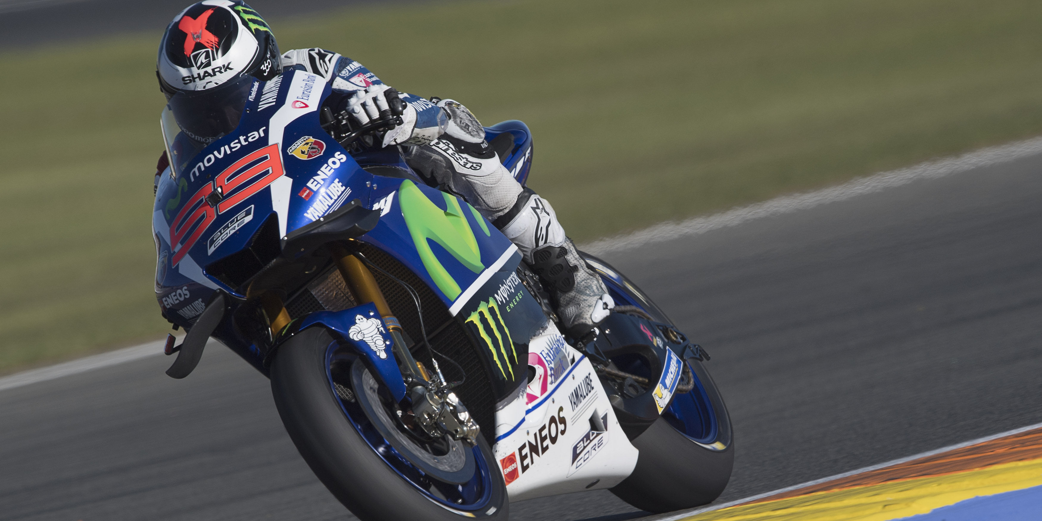 Lorenzo breaks lap record to continue Valencia dominance