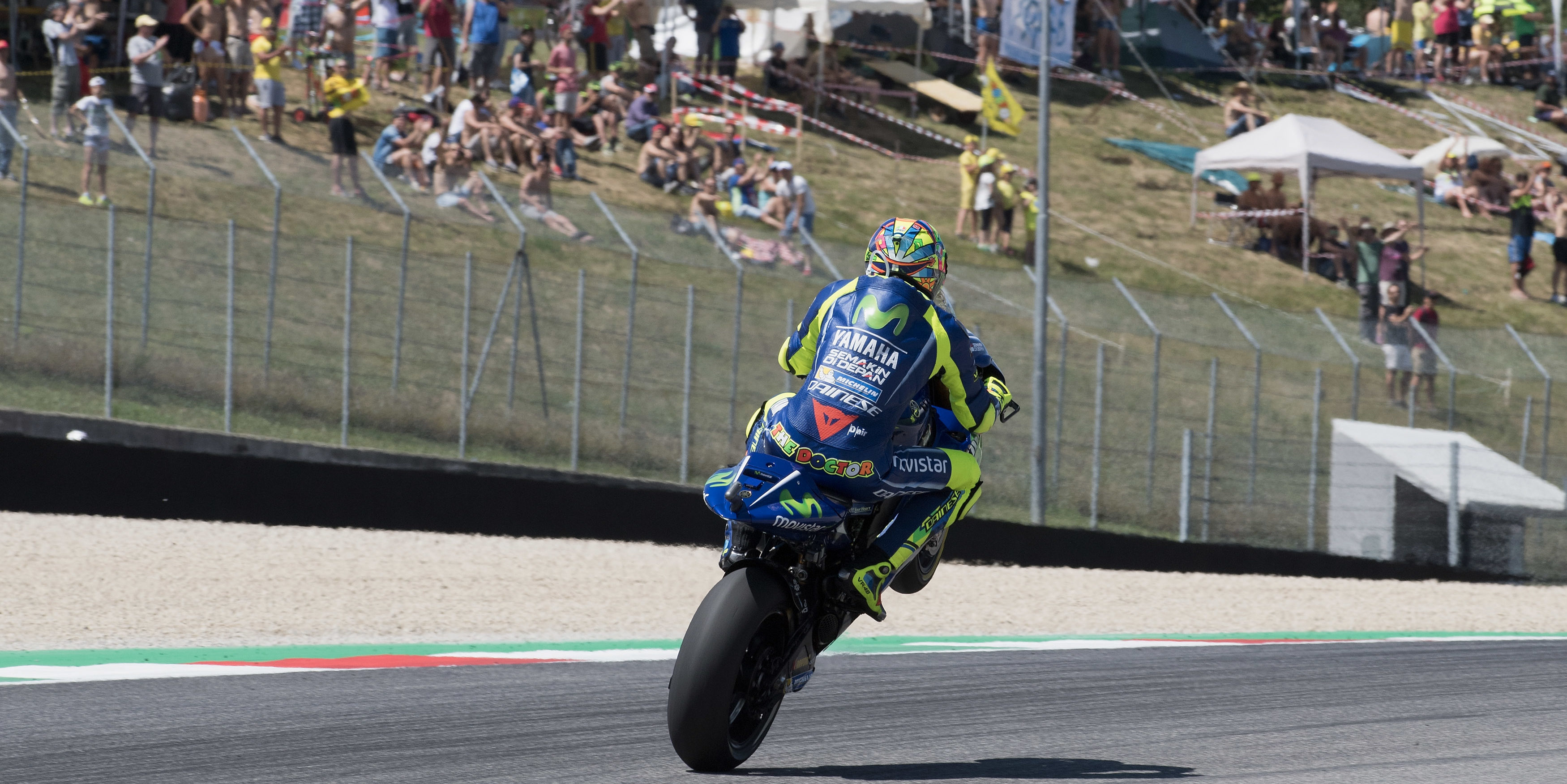 Rossi grits his teeth to go top in third practice
