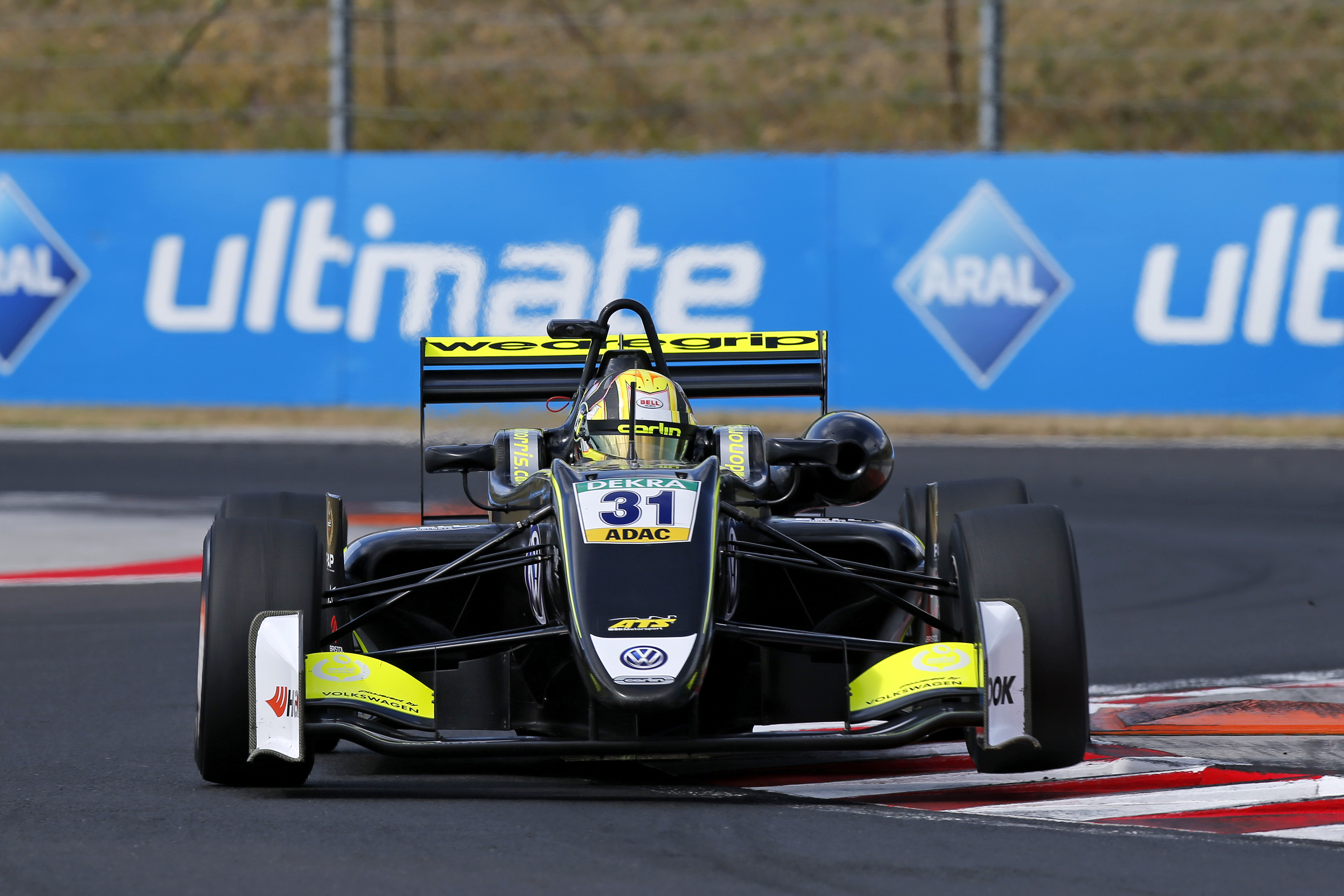 Norris takes podium as Zhou penalised