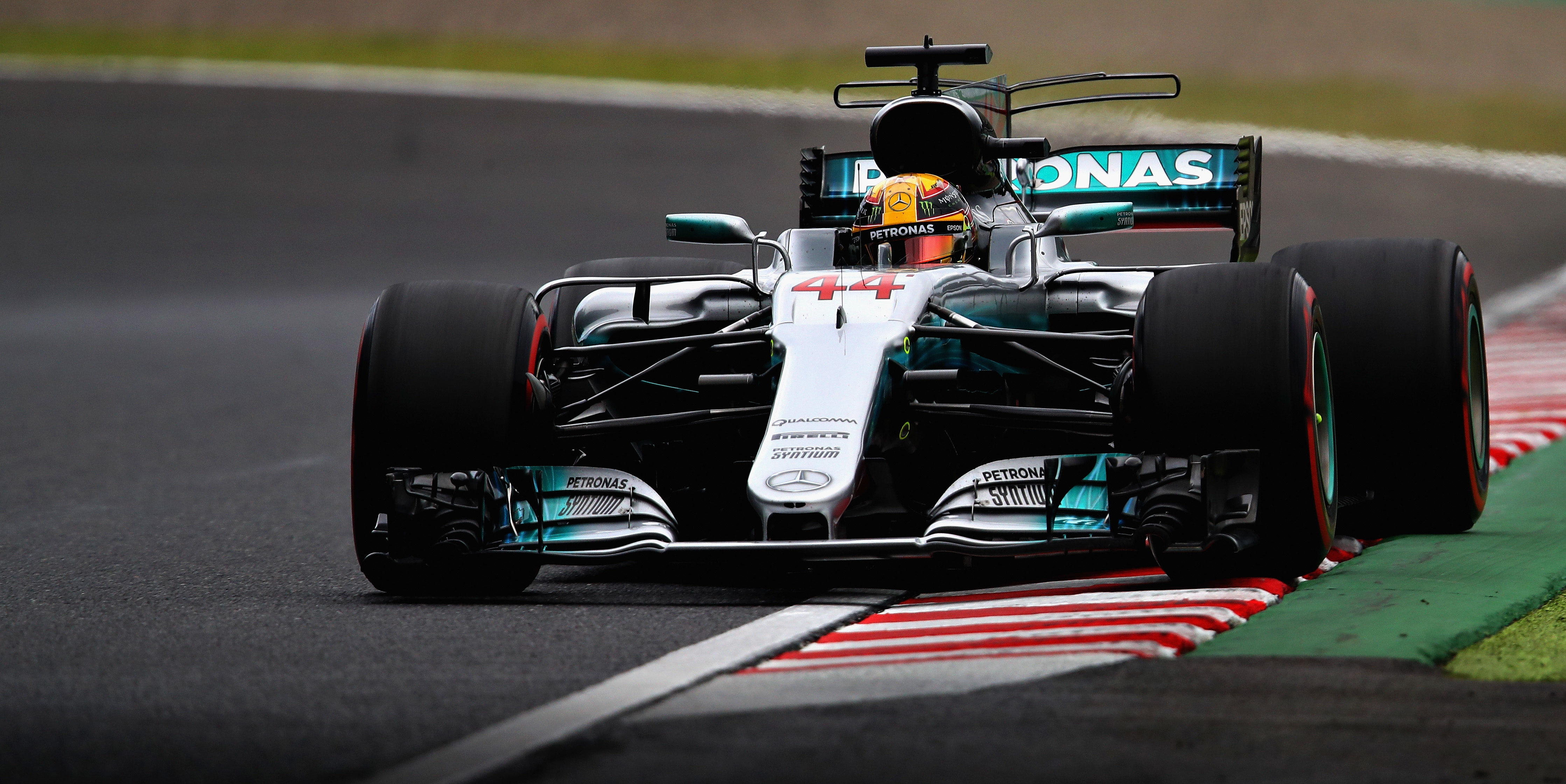 Hamilton hints at bigger challenge to come after pole