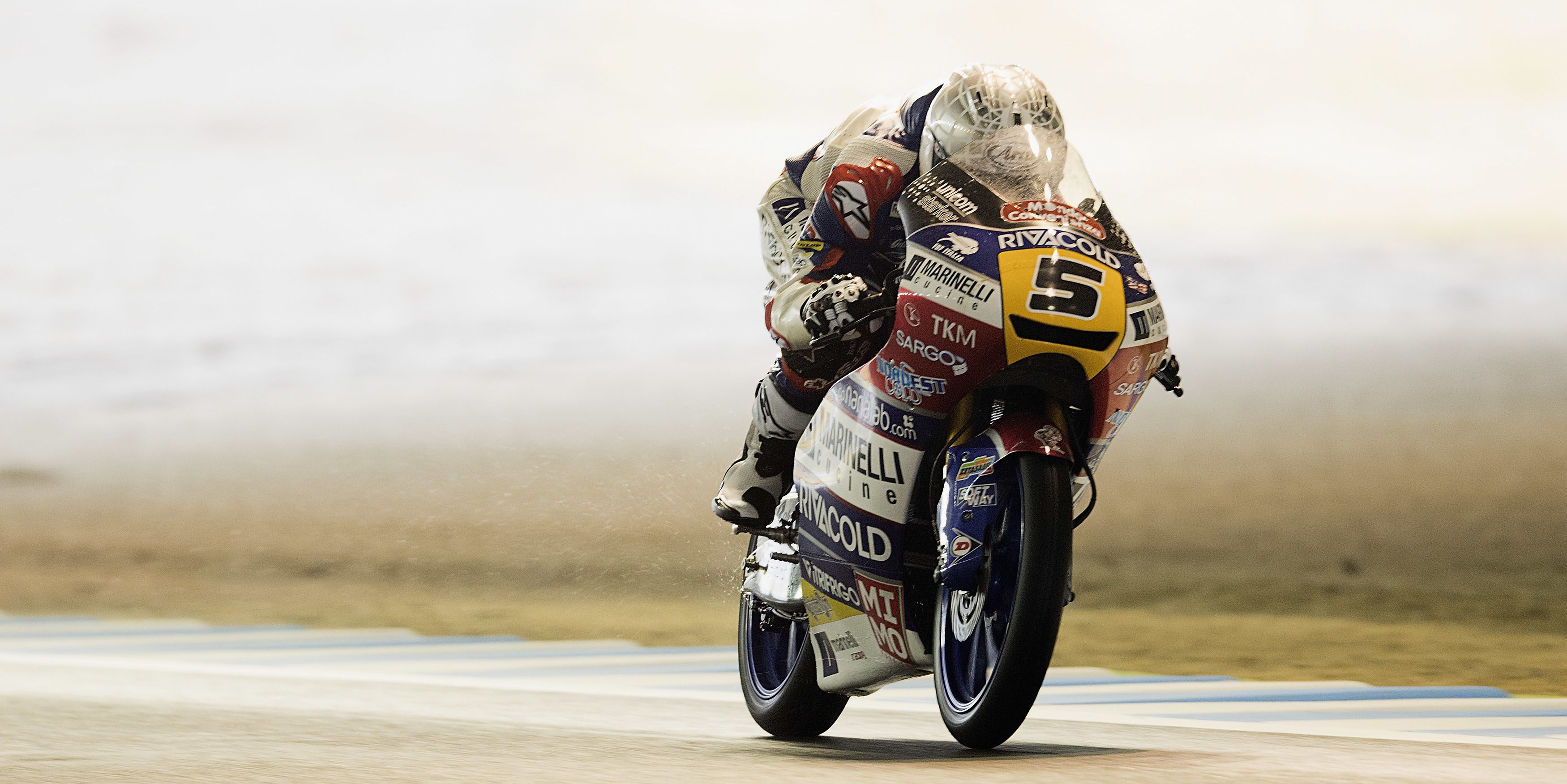 Fenati cruises to win at wet Motegi as Mir struggles