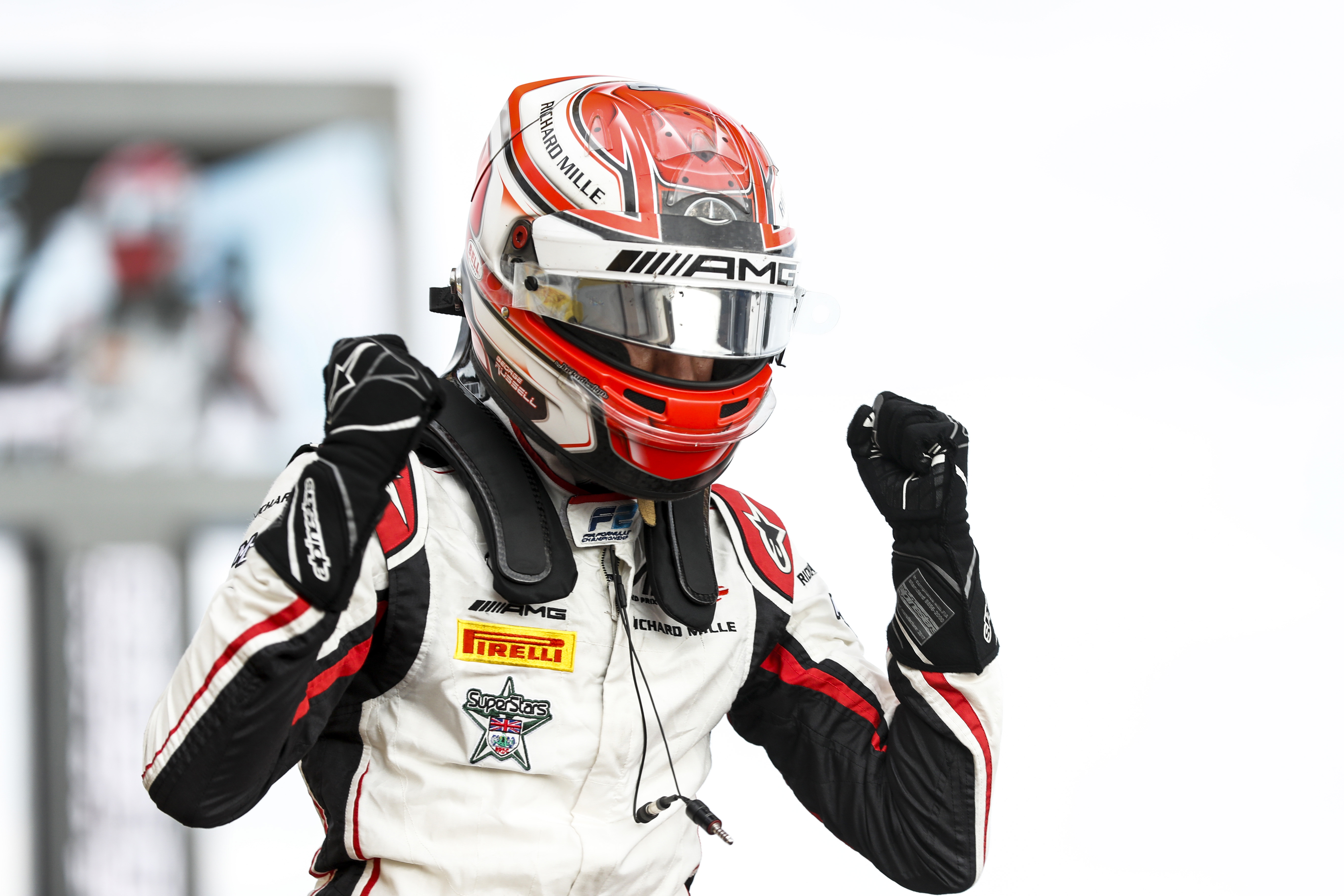 Russell overcomes damp conditions to win F2 feature race