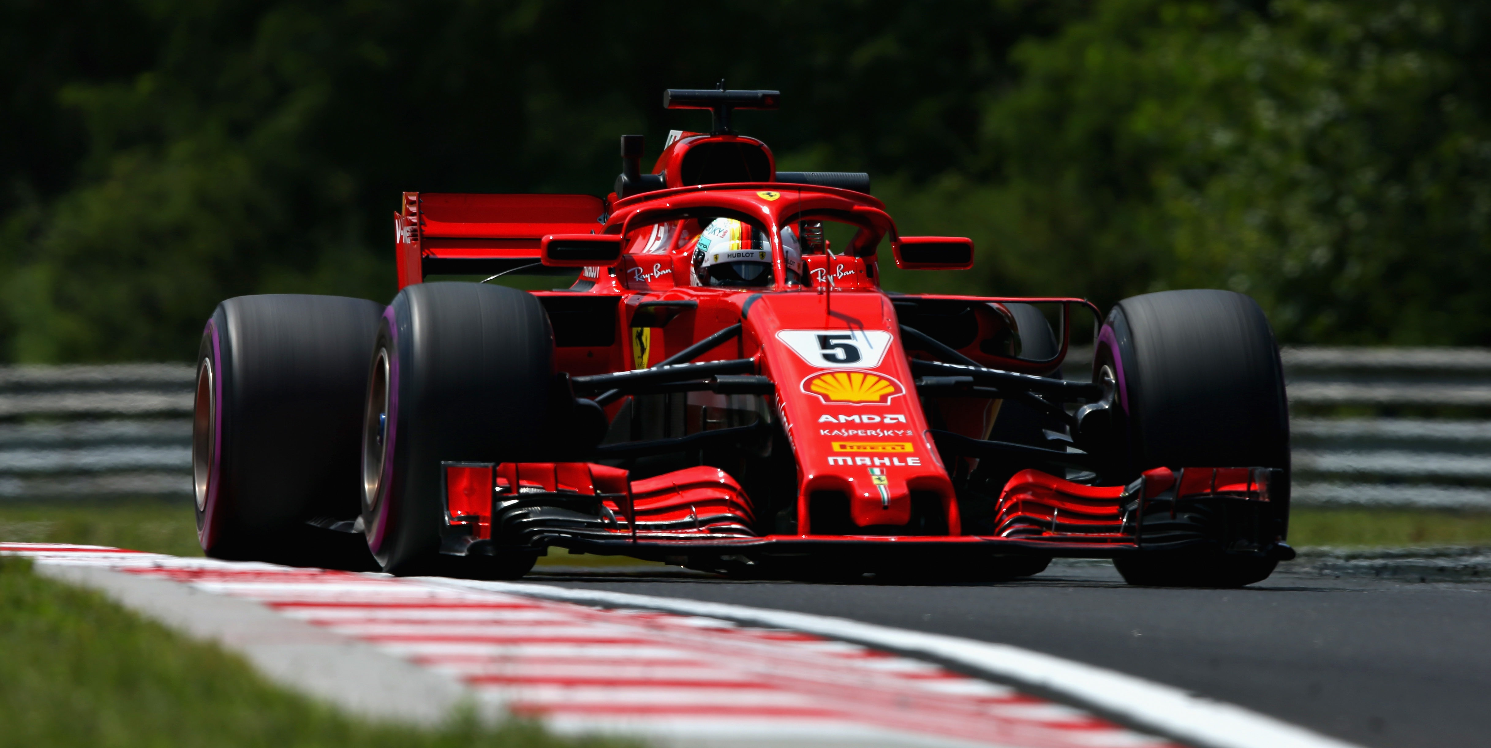 Vettel beats Red Bulls to top spot in Hungary FP2