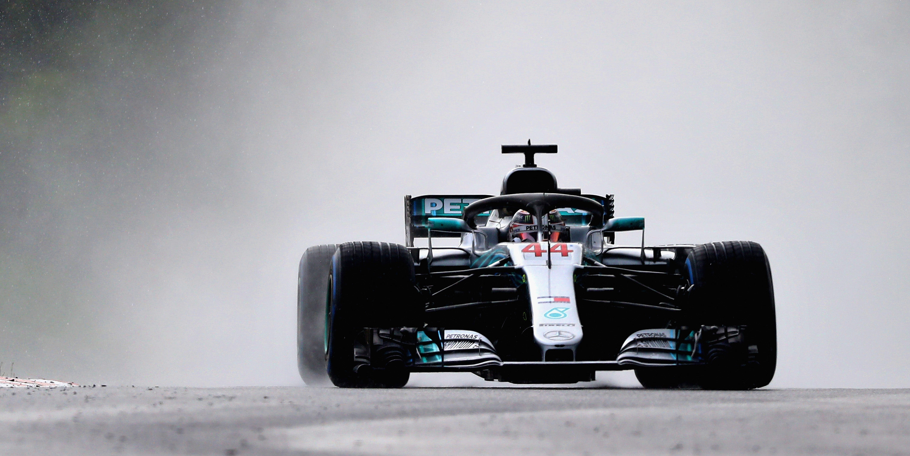 Hamilton leads Mercedes one-two in rain soaked qualifying