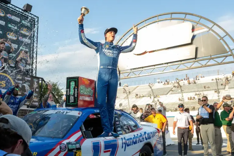Another one for Corey Day as he holds off Justin Allgaier