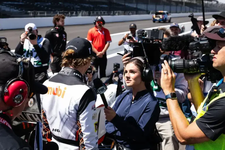 May 9, 2026, Speedway, Indiana, USA: FOX Sports pit reporter GEORGIA HENNEBERRY talks to the winner of the INDY NXT by Firestone Race 2, TYMEK KUCHARCZYK, after the conclusion of the event at the Indianapolis Motor Speedway road course. (Credit Image
