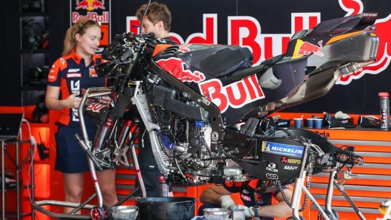 KTM MotoGP machinery being worked on in the team pit box