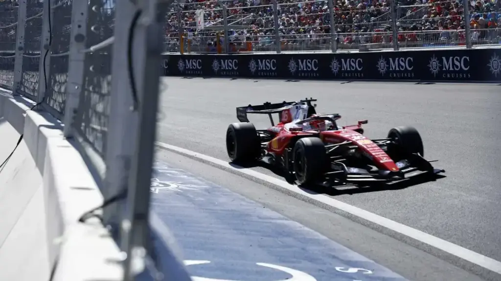 Charles Leclerc Ferrari engine: Charles Leclerc driving his Ferrari F1 car on track.