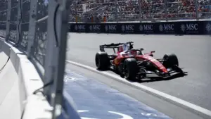 Charles Leclerc Ferrari engine: Charles Leclerc driving his Ferrari F1 car on track.