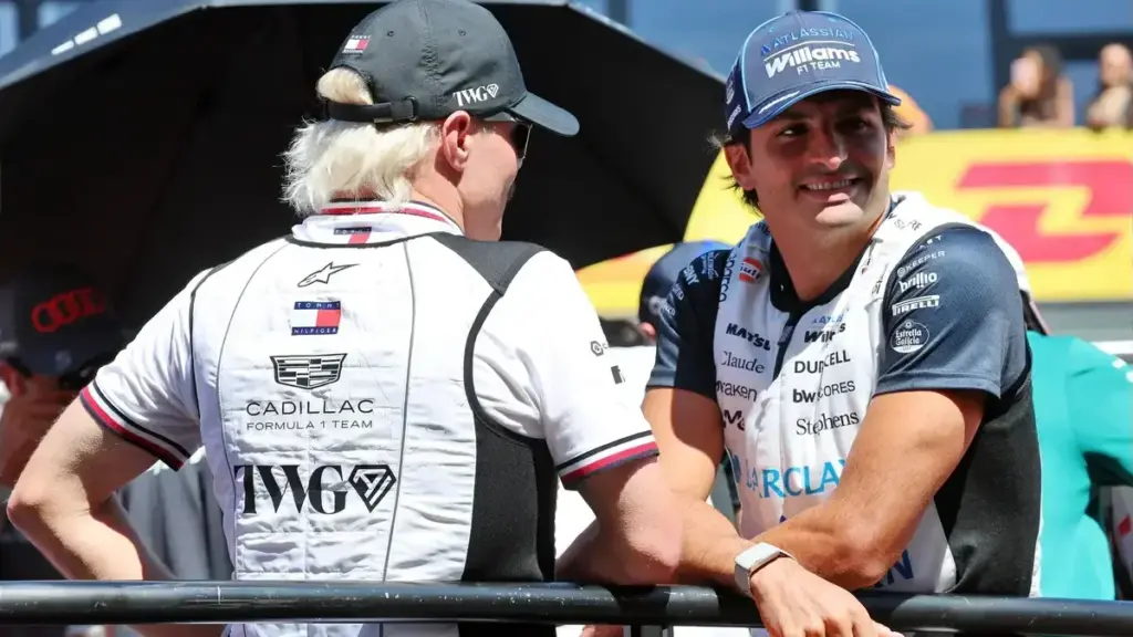 Williams upgrade Baku: Carlos Sainz wearing Williams team gear chatting during a drivers' parade.