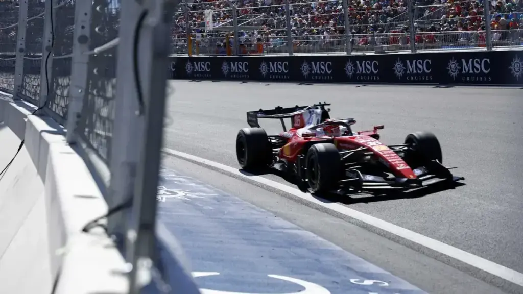 Charles Leclerc Ferrari chassis: Charles Leclerc driving his Ferrari F1 car on track.