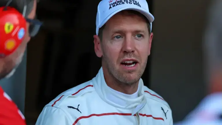 Sebastian Vettel F1 2026 regulations: Sebastian Vettel speaking in the F1 paddock